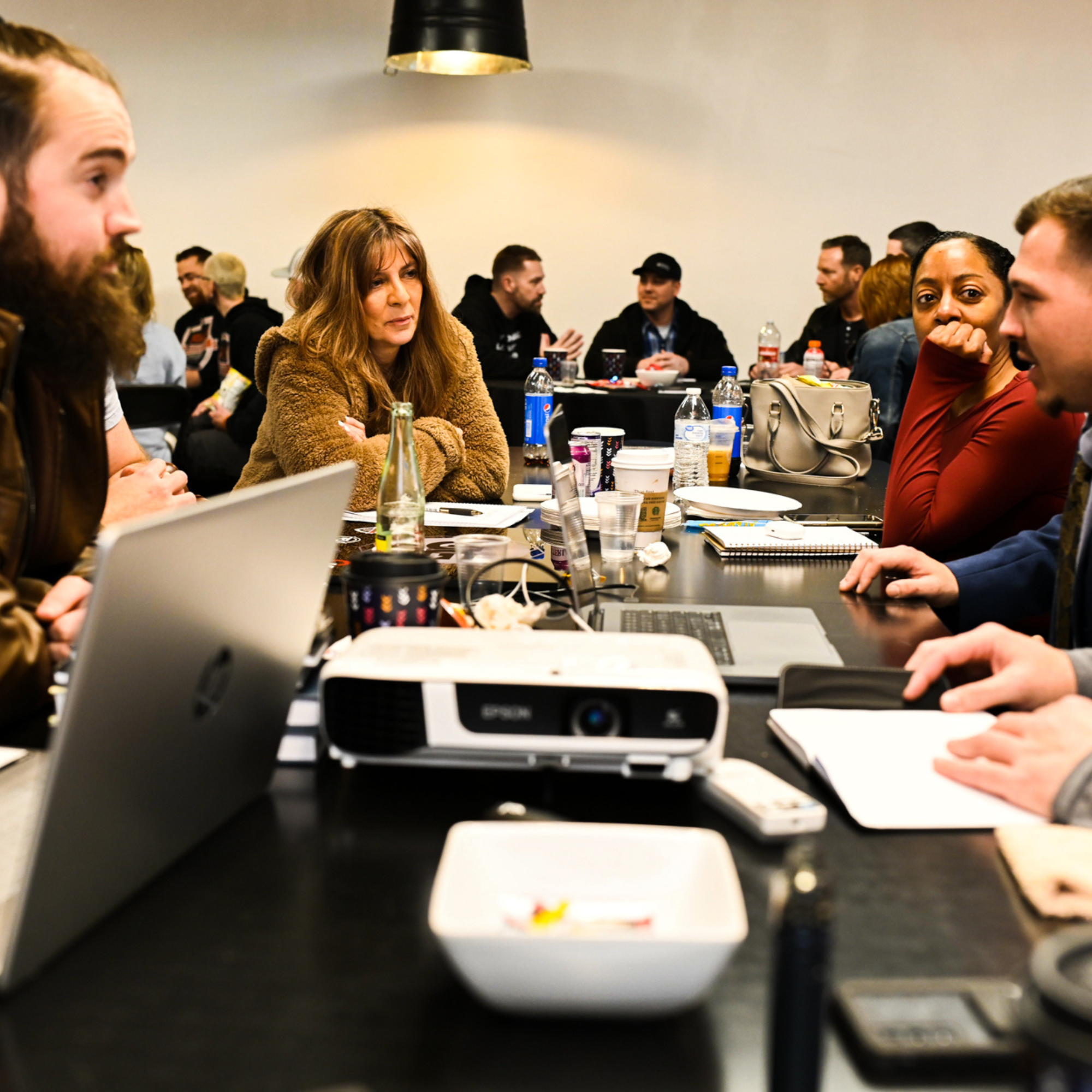 Deep-dive workshop sessions — owners doing the actual work